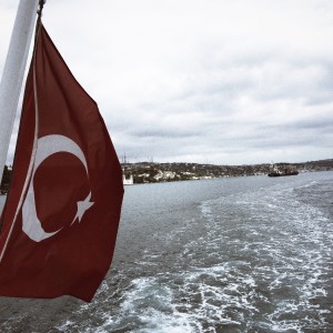 A Turkish flag flutters in the wind, on a ferry on the Bosphorus river in Istanbul. 